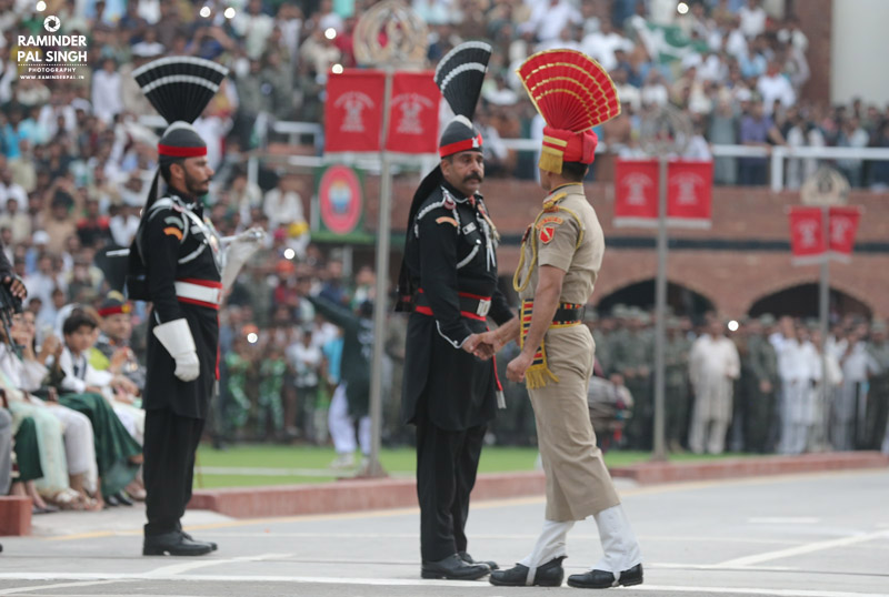 retreat ceremony at wagha/ attari border at indo pak border, soldiers staring at each other.