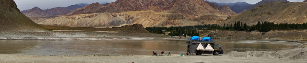 <img src="caravan family holidays offbeat village camp.jpeg" alt="soft adventure campervan vacation overlanding holiday onboard overland truck vanlife with weber barbecue grill food experience wilderness with caravan motorhome for best family vacations pong dam himachal pradesh ladakh rajasthan kutch gujarat">