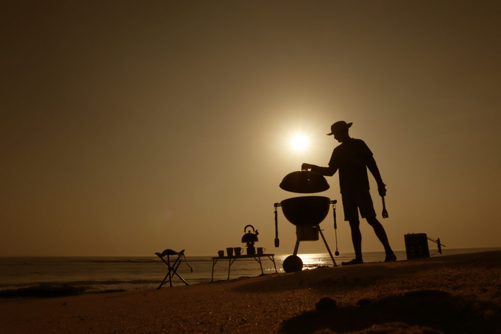 <img src="offbeat caravan camp barbecue beach holiday.jpeg" alt="campervan vacation overlanding holiday onboard overland truck with weber barbecue grill food experience wilderness at sunset sunrise caravan and campervan for best road trip kutch gujarat pingleshwar india">