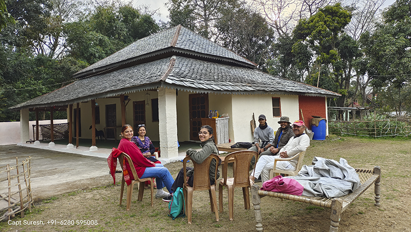 a family enjoying offbeat family holidays in barot valley caravan motorhome campervan outdoor camping in himachal.