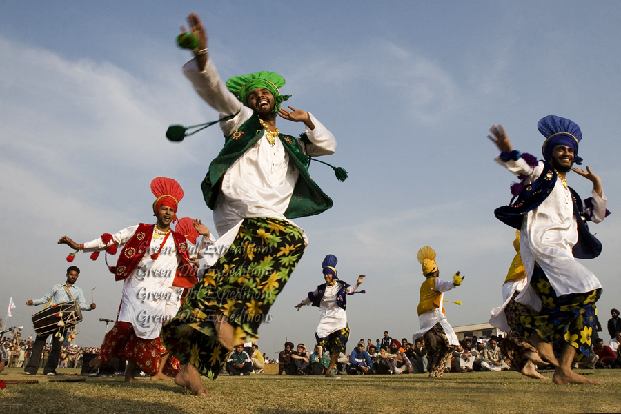 <img src="bhangra folk dance of punjab.jpeg" alt="best photo tour experience punjabi culture, festivals and folk art luxury nomadic unique experience of outdoor overlanding camp for best photography quiet secluded place very intimate experience">