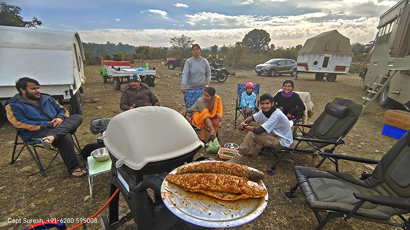 <img src="camping trailer family holidays caravan himachal.jpeg" alt="offbeat family holiday in wilderness with camping trailers caravan RV campervan motorhome nomadic unique experiential vacation pong dam himachal">