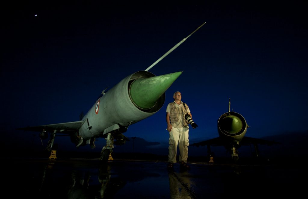 <img src="capt suresh sharma with MiG21" alt=" capt suresh, team leader of green dot expeditions, photographed MiG21 with elinchrom quadra ranger for a coffee table table"> 