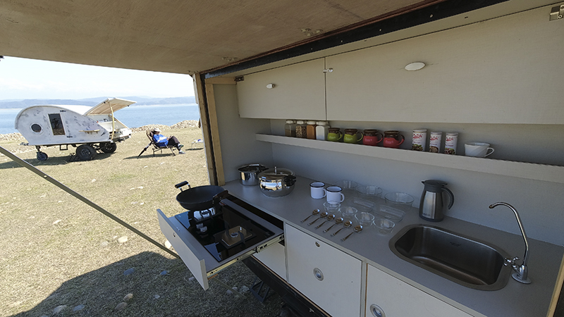 offbeat nomadic holiday caravan campervan motorhome for families couples romantic outdoor experience camp to relax unwind quiet place at secluded locations barot valley in himachal pradesh.