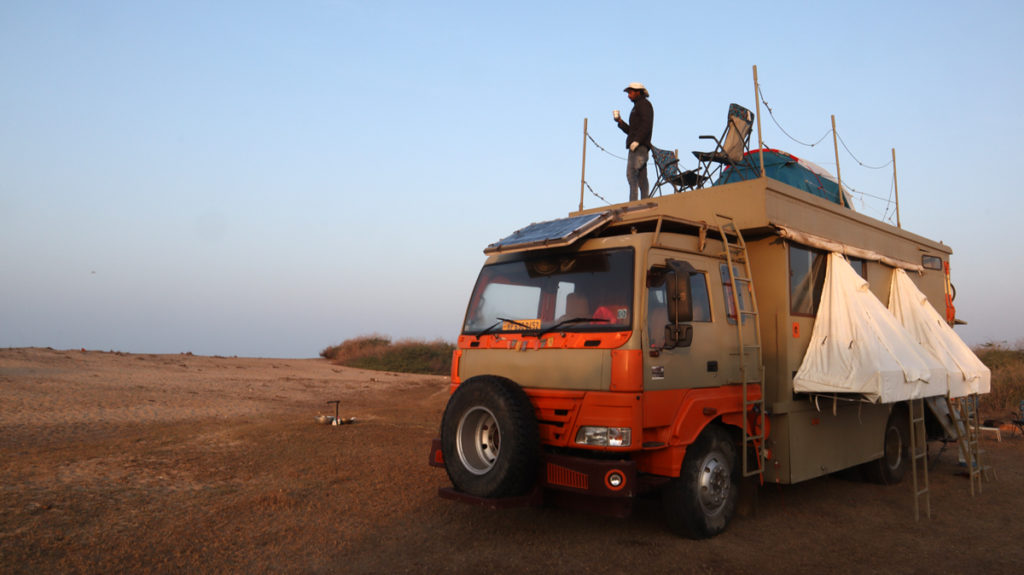 <img src="campervan caravan offbeat camp.jpeg" alt="soft adventure campervan vacation overlanding holiday onboard overland truck vanlife with weber barbecue grill food experience wilderness at sunset sunrise caravan and campervan for best for family kutch gujarat">