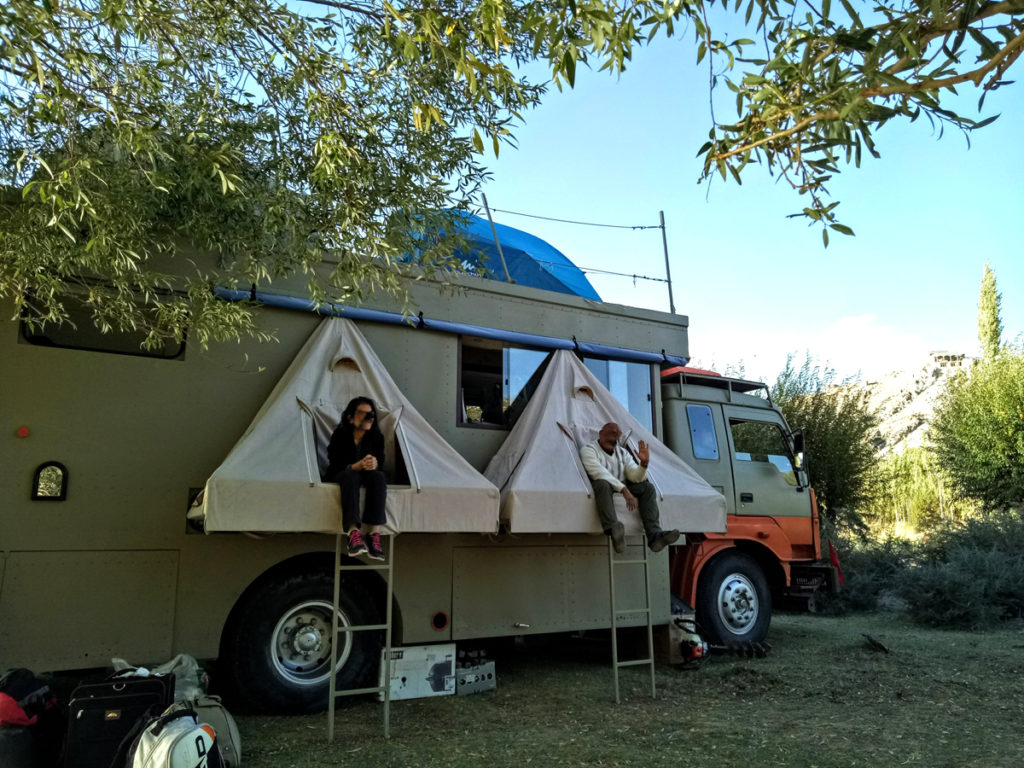 <img src="caravan campervan holidays in riverside camp.jpeg" alt="covid19 corona safe camp adventure campervan riverside camping vacation overlanding holiday overland truck vanlife weber barbecue grill q3200 food experience wilderness caravan motorhome camping for best nomadic family kutch, gujarat, rajasthan, himachal, ladakh">