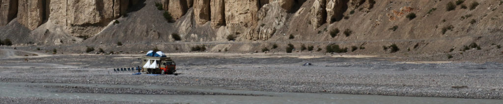 <img src="riverside lakeside offbeat vacation.jpeg" alt="offbeat exotic exclusive corona / covid-19 safe private quiet campervan vacation overlanding overland truck vanlife lakeside camp experience wilderness caravan for best family holiday and couple ladakh">
