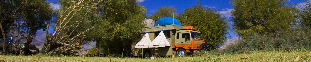 <img src="corona caravan campervan safe offbeat holidays.jpeg" alt="covid19 corona safe soft adventure caravan campervan vacation overlanding holiday onboard overland truck vanlife with weber barbecue grill food experience wilderness at sunset sunrise caravan vanlife for best for family barot valley himachal pradesh">