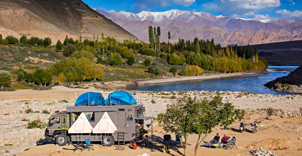 <img src="caravan offbeat riverside camp campervan india.jpeg" alt="caravan soft adventure india campervan vacation overlanding holiday onboard overland truck with weber barbecue grill food experience wilderness at sunset sunrise caravan and campervan for best for family road trip ladakh jaisalmer rajasthan kutch gujarat india">  
