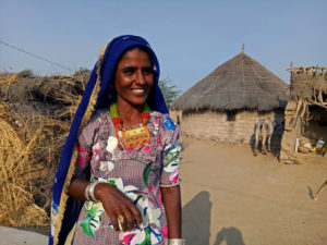 <img src="border village rajasthan.jpeg" alt="village woman smiling and village life in huts at its best">   