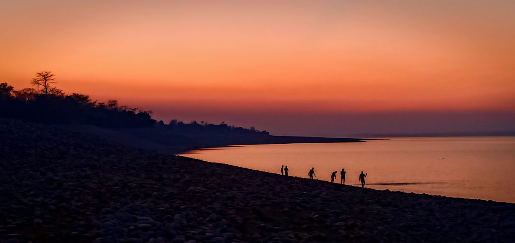 <img src="wilderness sunset himachal pradesh HP.jpeg" alt="offbeat luxury overland truck campervan caravan at backwater lake of pong dam for best sunset sunrise and moonlit night lifetime experience romantic holidays for couples himachal pradesh">