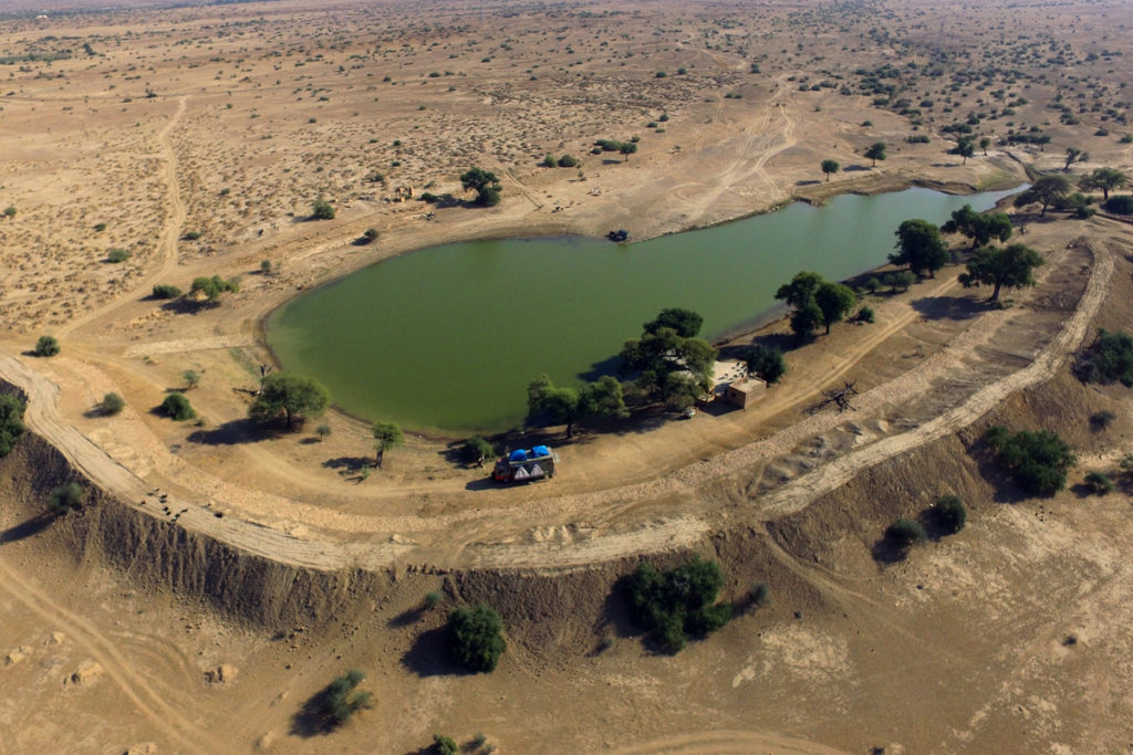 <img src="Offbeat caravan camping lakeside.jpeg" alt="caravan campervan overland truck nomadic holiday for families couples romantic unique lifetime experience offbeat outdoor camp to relax unwind quiet place at secluded locations vanlife kutch gujarat rajasthan ladakh himachal">