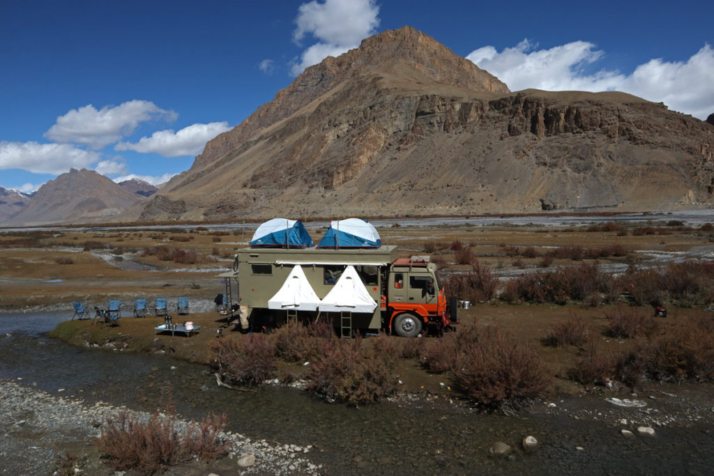 <img src="caravan holidays india campervan camping himachal.jpeg" alt="caravan holidays india with campervan overland truck nomadic vacation for families couples romantic lifetime experience offbeat outdoor camp pong dam dadasiba himachal pradesh india">