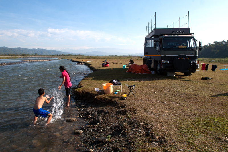 <img src="offbeat riverside campervan camp family holidays punjab.jpeg" alt="soft adventure campervan vacation overlanding holiday onboard overland truck vanlife with weber barbecue grill food experience wilderness at sunset sunrise caravan and campervan for best for family road trip india">  