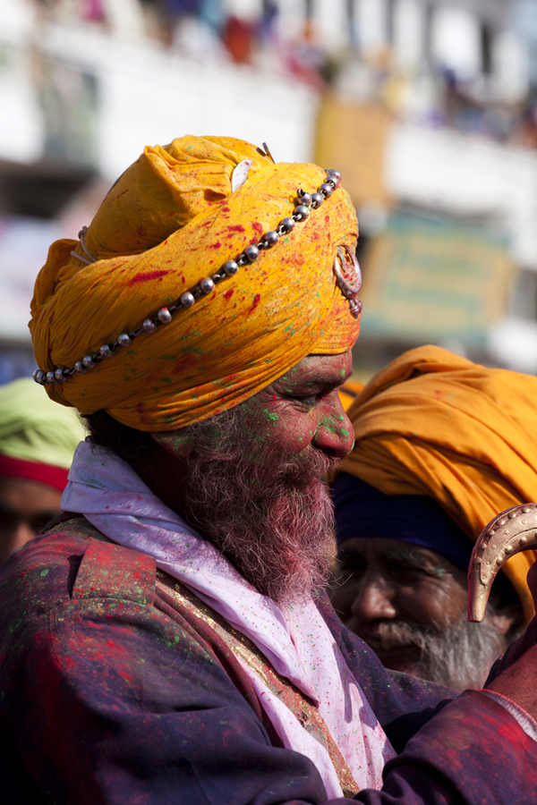 nihang sikhs playing holi with colours at anandpur sahab during hola mohalla in punjab.
