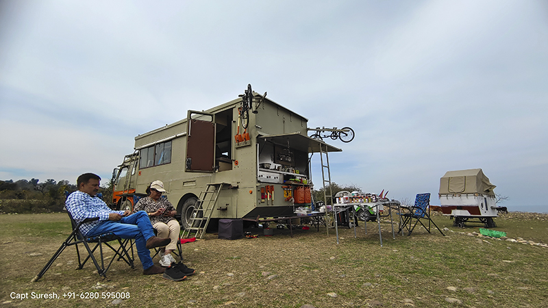 couple enjoying caravan on rental motorhome hiring campervan hired for pong dam in himachal for offbeat camp mcleodganj kangra palampur. 