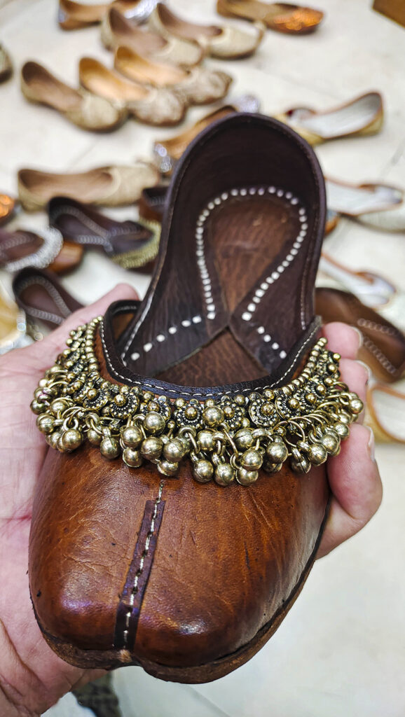 <img src="punjabi kasuri jutti tille wali amritsar.jpeg" alt="punjabi jutti kasuri tille wali is a traditional handmade footwear shoe for ladies very popular in punjab amritsar india">