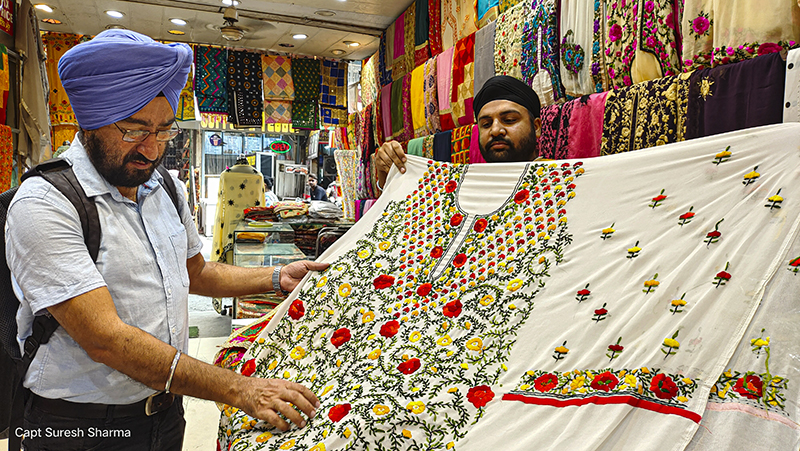 <img src="punjabi suits panjabi dresses amritsar.jpeg" alt=" punjabi suits panjabi dresses of amritsar are folk embroidery on cloth for weddings and festivals india">
