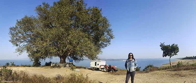 single woman enjoying at offbeat location around Pong Dam reservoir in Himachal. 